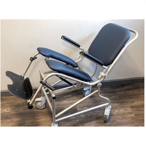 Shower and Commode Chair: Rocker on Wheels